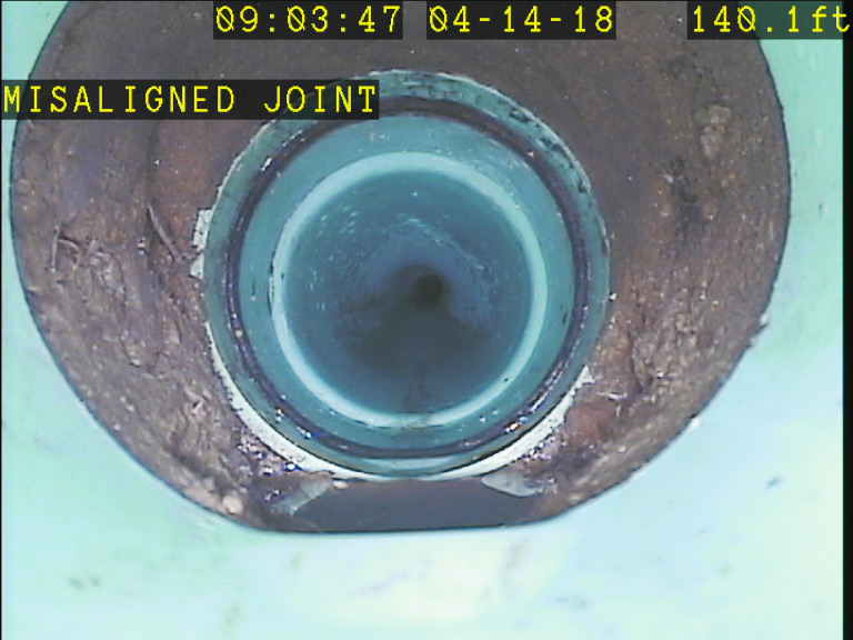 Sewer scope revealed city main connection was damaged.